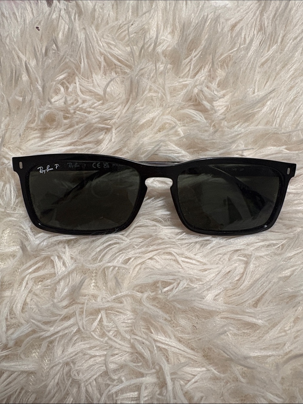 Ray-Ban Black Frame Sunglasses with Dark Lenses